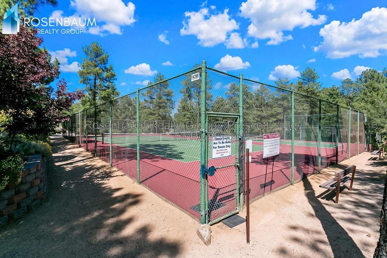 Charming 3-Beds, 2-Baths Single-Level Retreat Among the Pines! property image